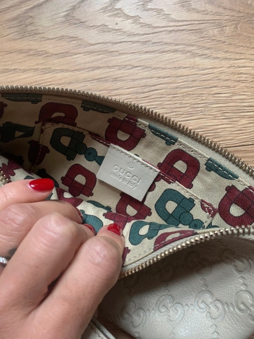 Gucci Pochette monogram avorio pelle