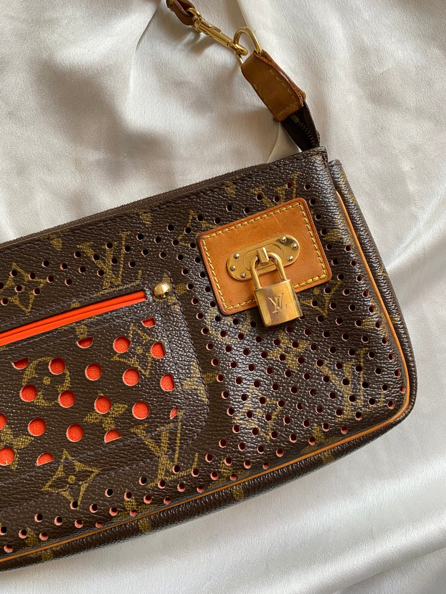 Louis Vuitton pochette accessoire perforated orange