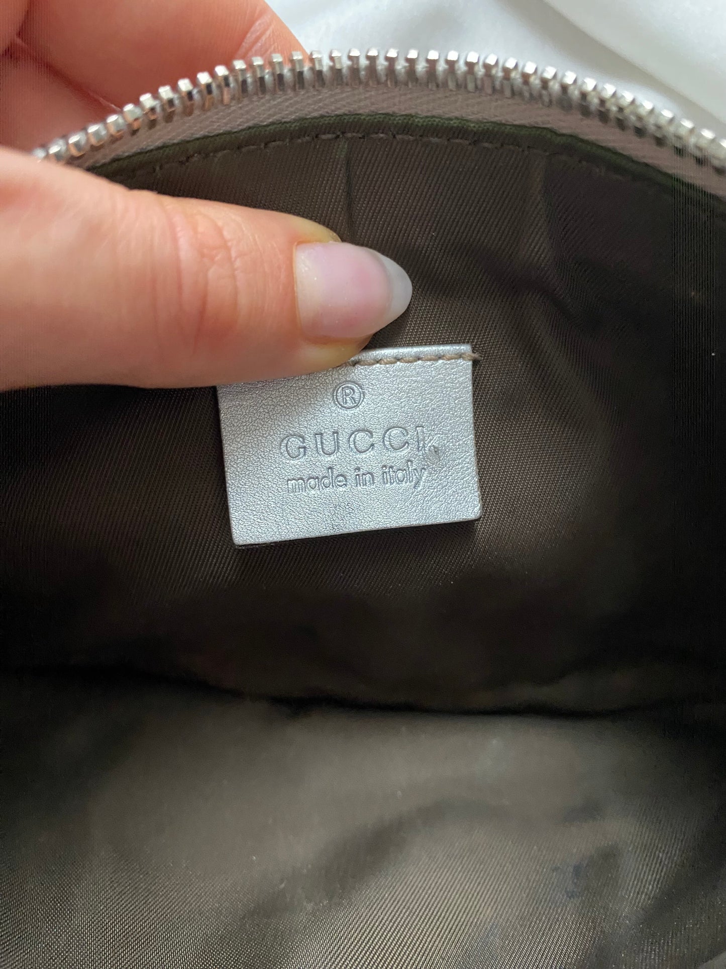 Gucci Pochette monogram pelle argento