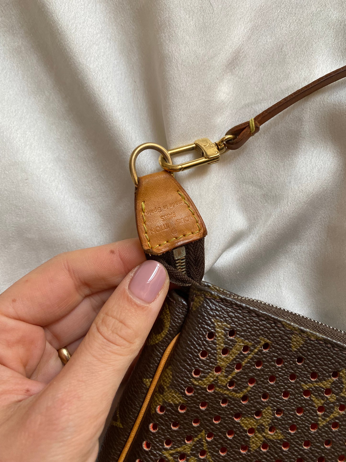 Louis Vuitton pochette accessoire perforated orange
