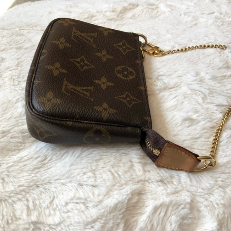 Louis Vuitton mini pochette accessoire monogram ottime condizioni