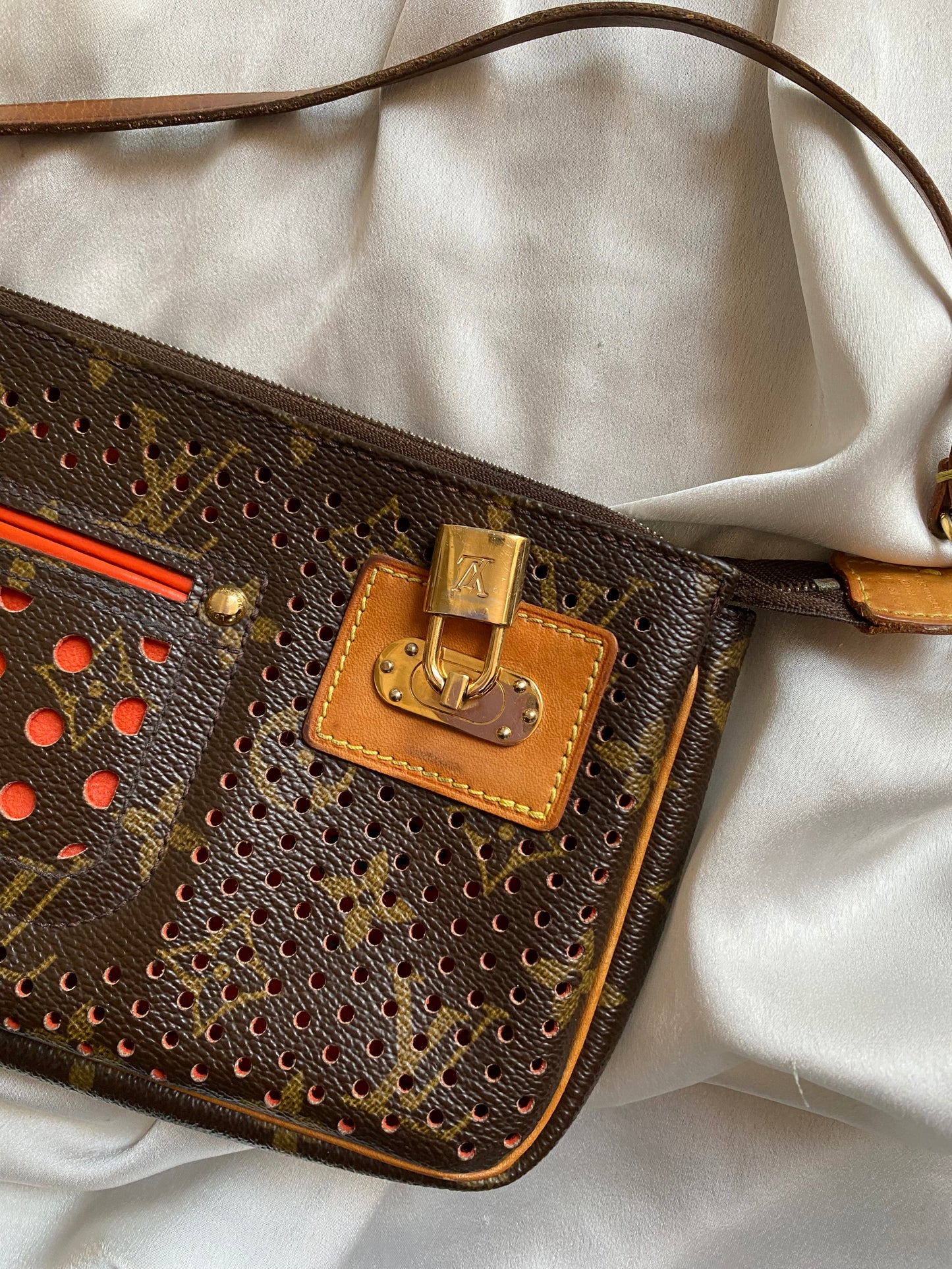 Louis Vuitton pochette accessoire perforated orange