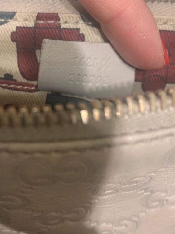 Gucci Pochette monogram avorio pelle