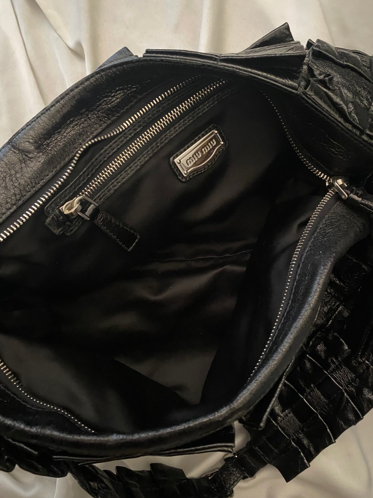 Miu miu wavy black bag