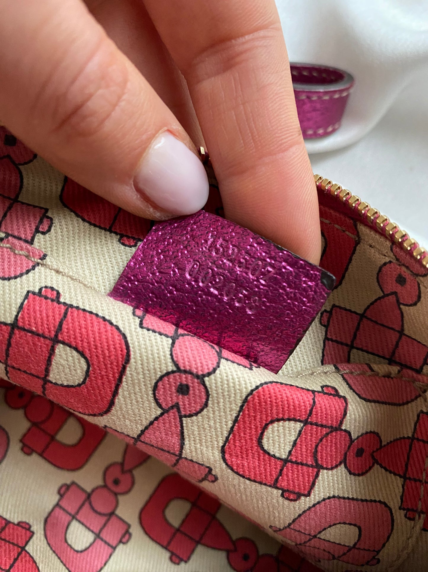 Gucci pochette monogram beige e fucsia