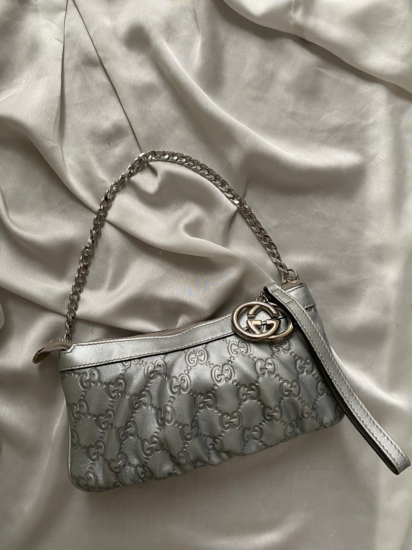 Gucci Pochette monogram pelle argento
