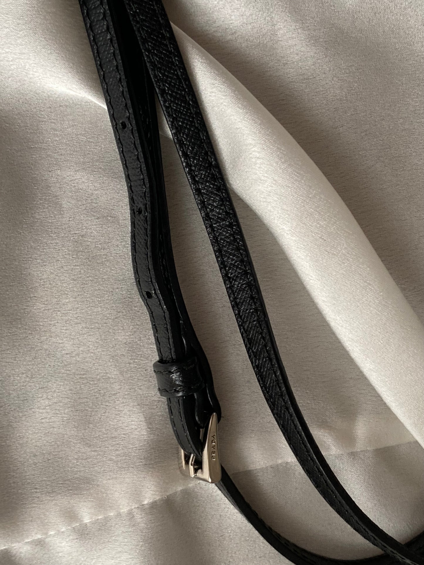 Prada mini grommet