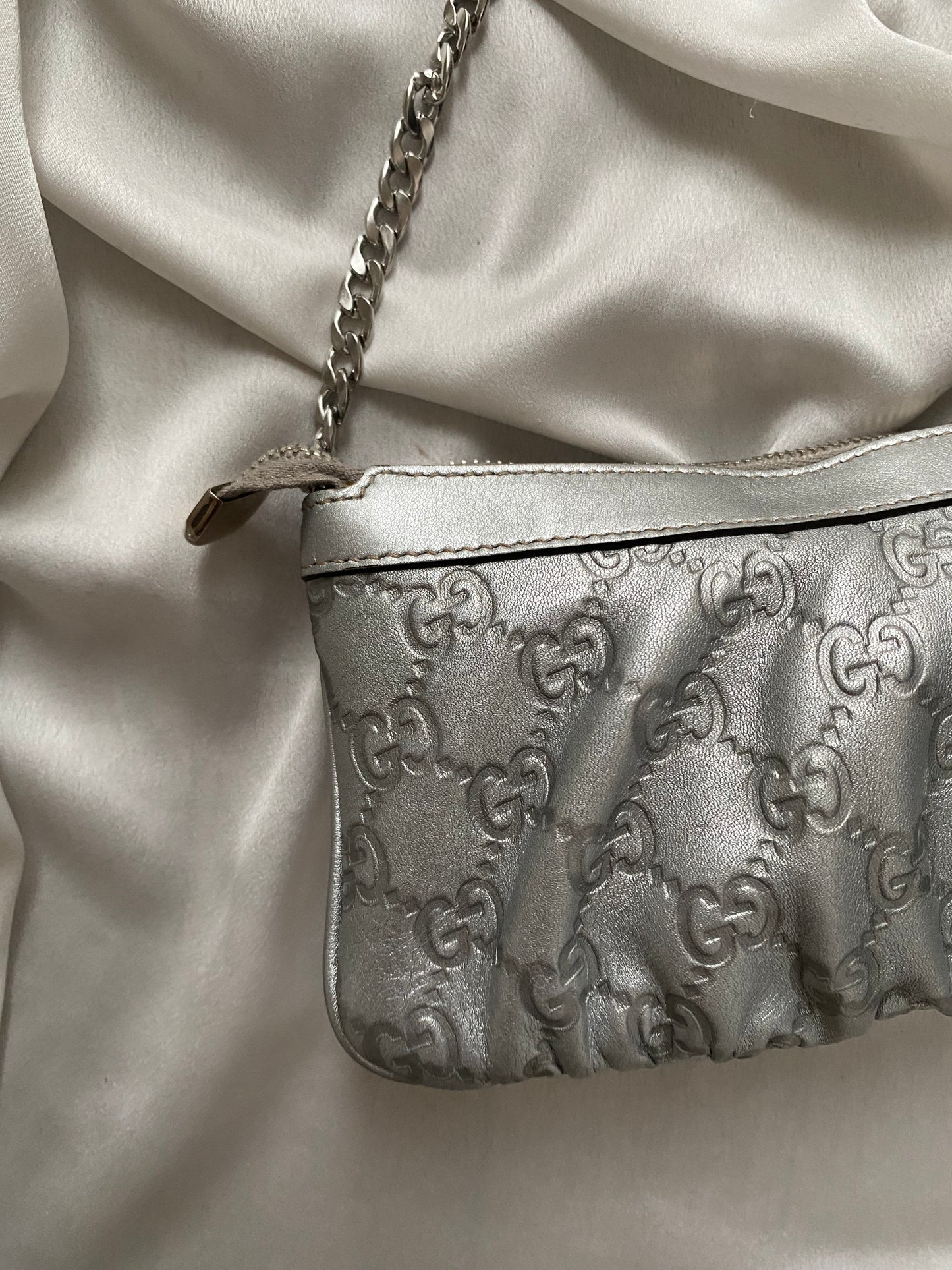 Gucci Pochette monogram pelle argento
