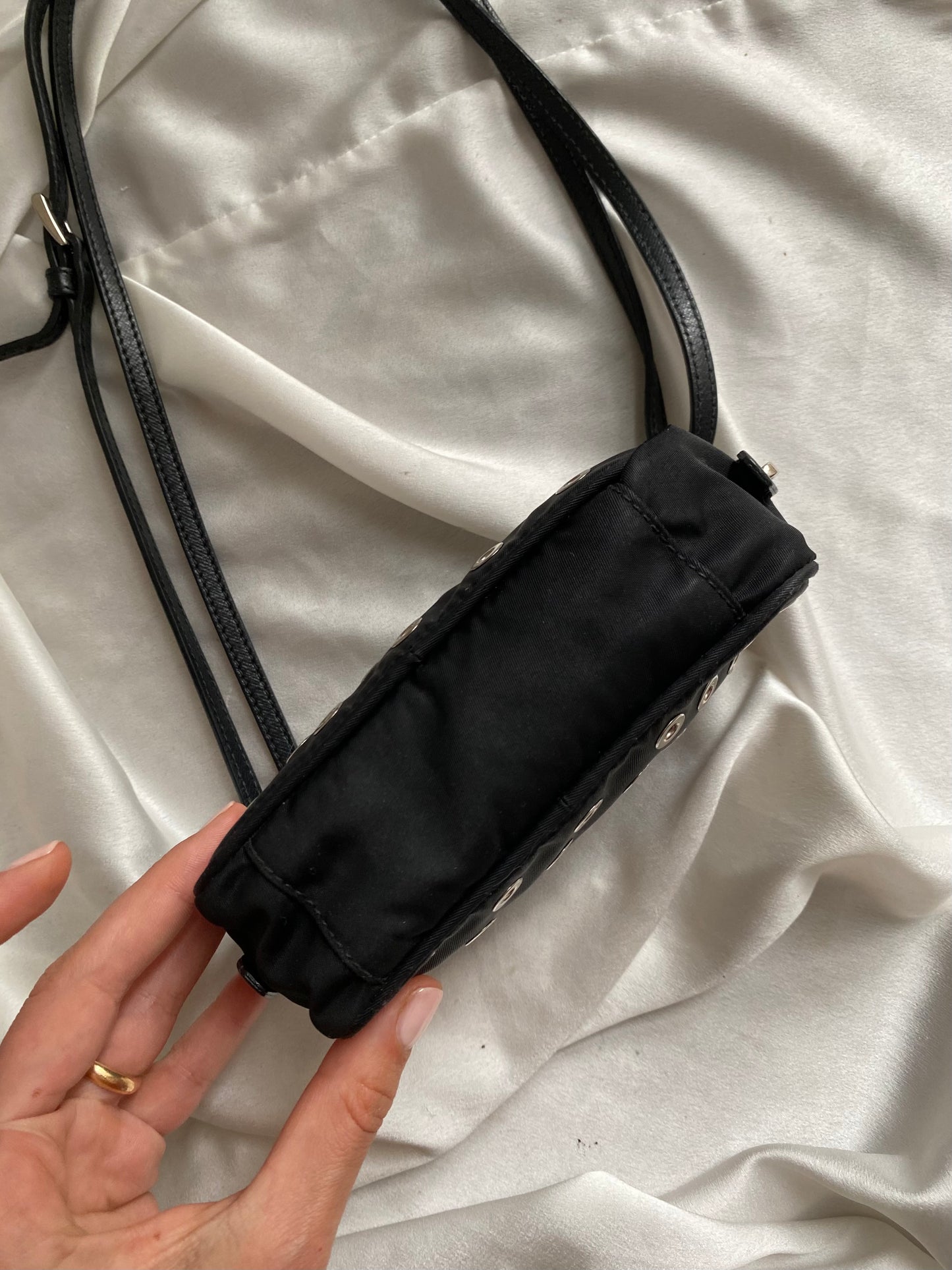 Prada mini grommet