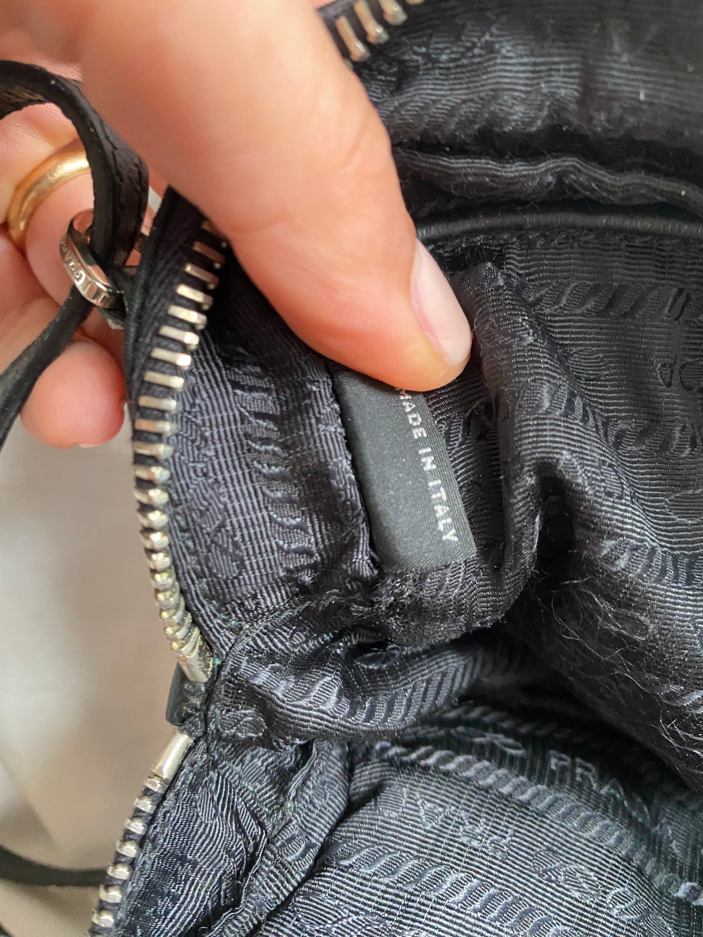Prada mini grommet