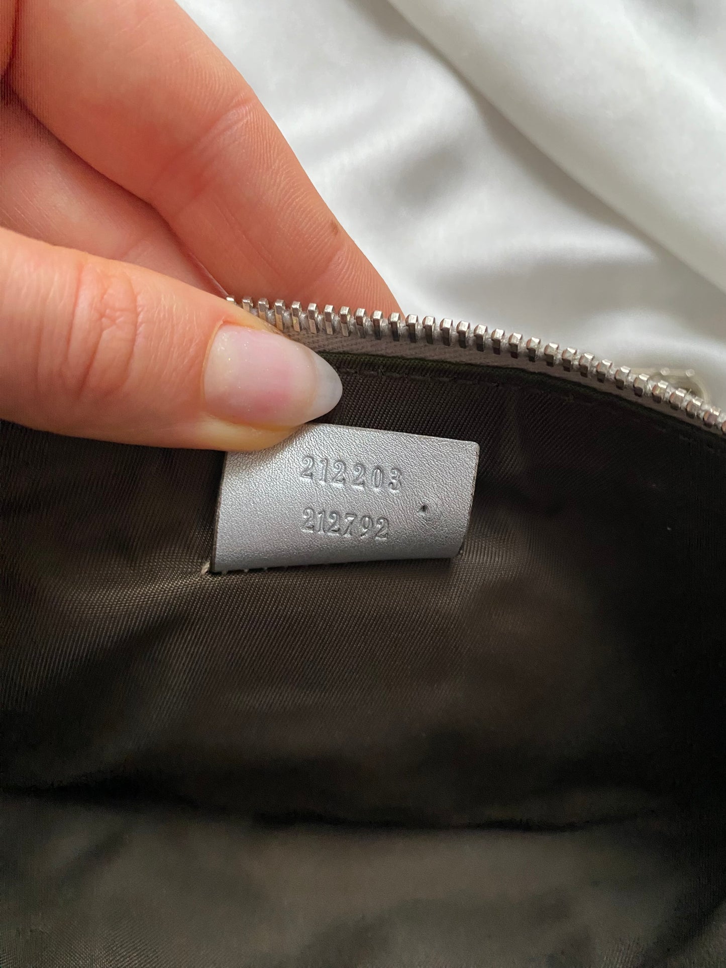 Gucci Pochette monogram pelle argento
