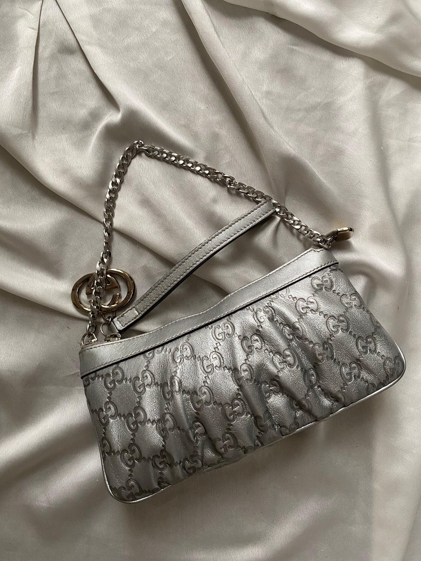 Gucci Pochette monogram pelle argento