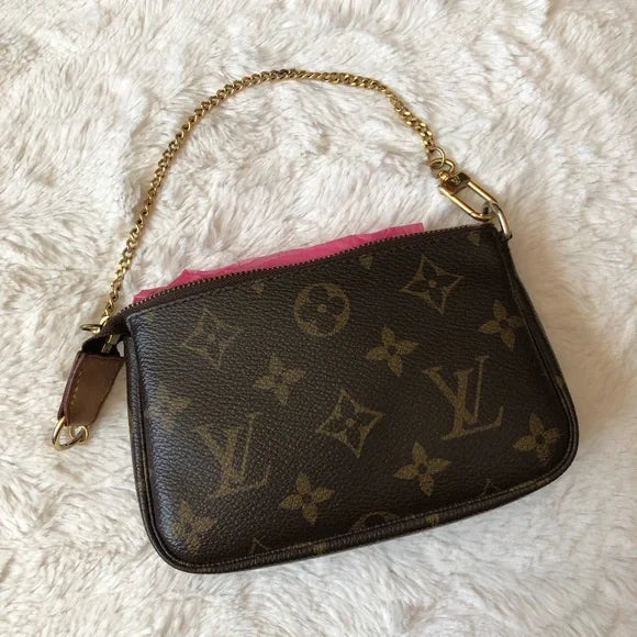 Louis Vuitton mini pochette accessoire monogram ottime condizioni