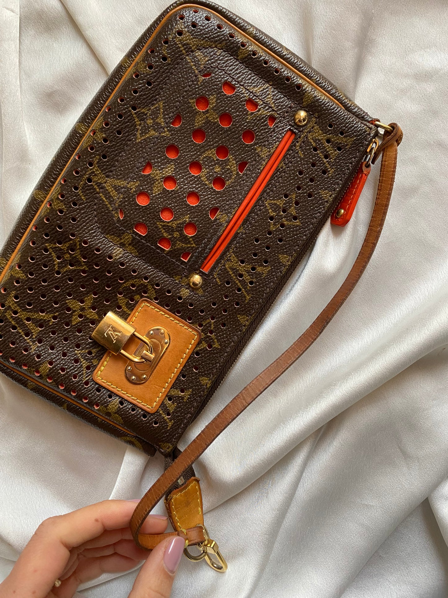 Louis Vuitton pochette accessoire perforated orange