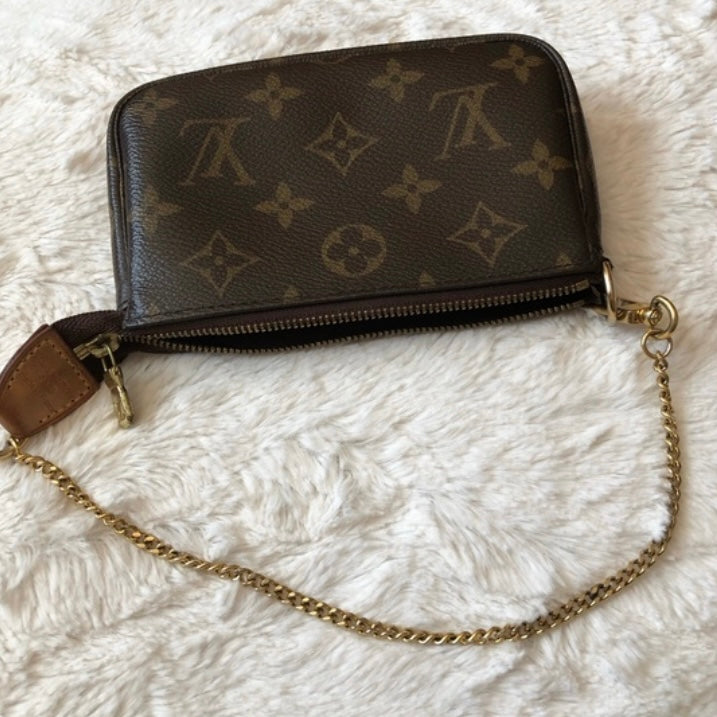 Louis Vuitton mini pochette accessoire monogram ottime condizioni