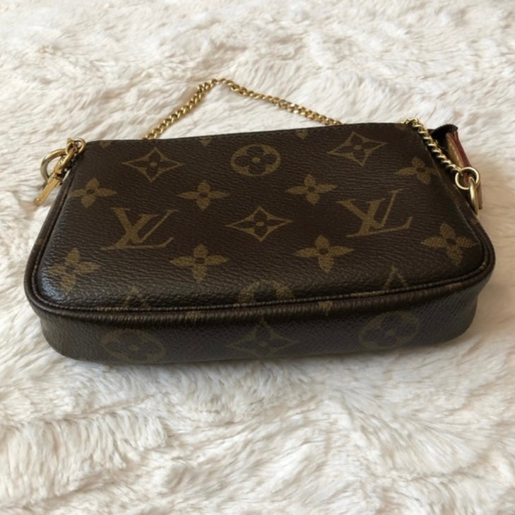 Louis Vuitton mini pochette accessoire monogram ottime condizioni