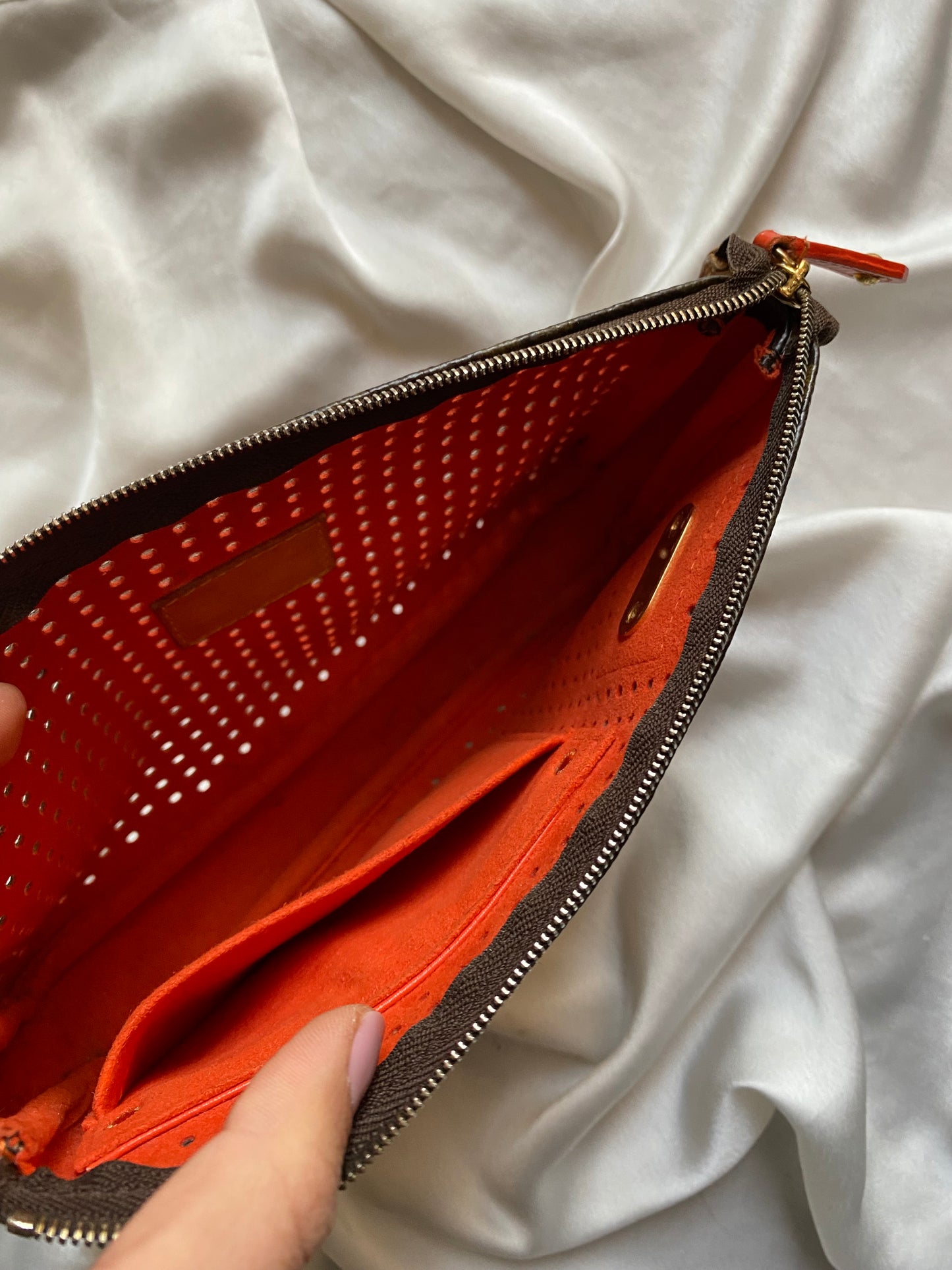 Louis Vuitton pochette accessoire perforated orange
