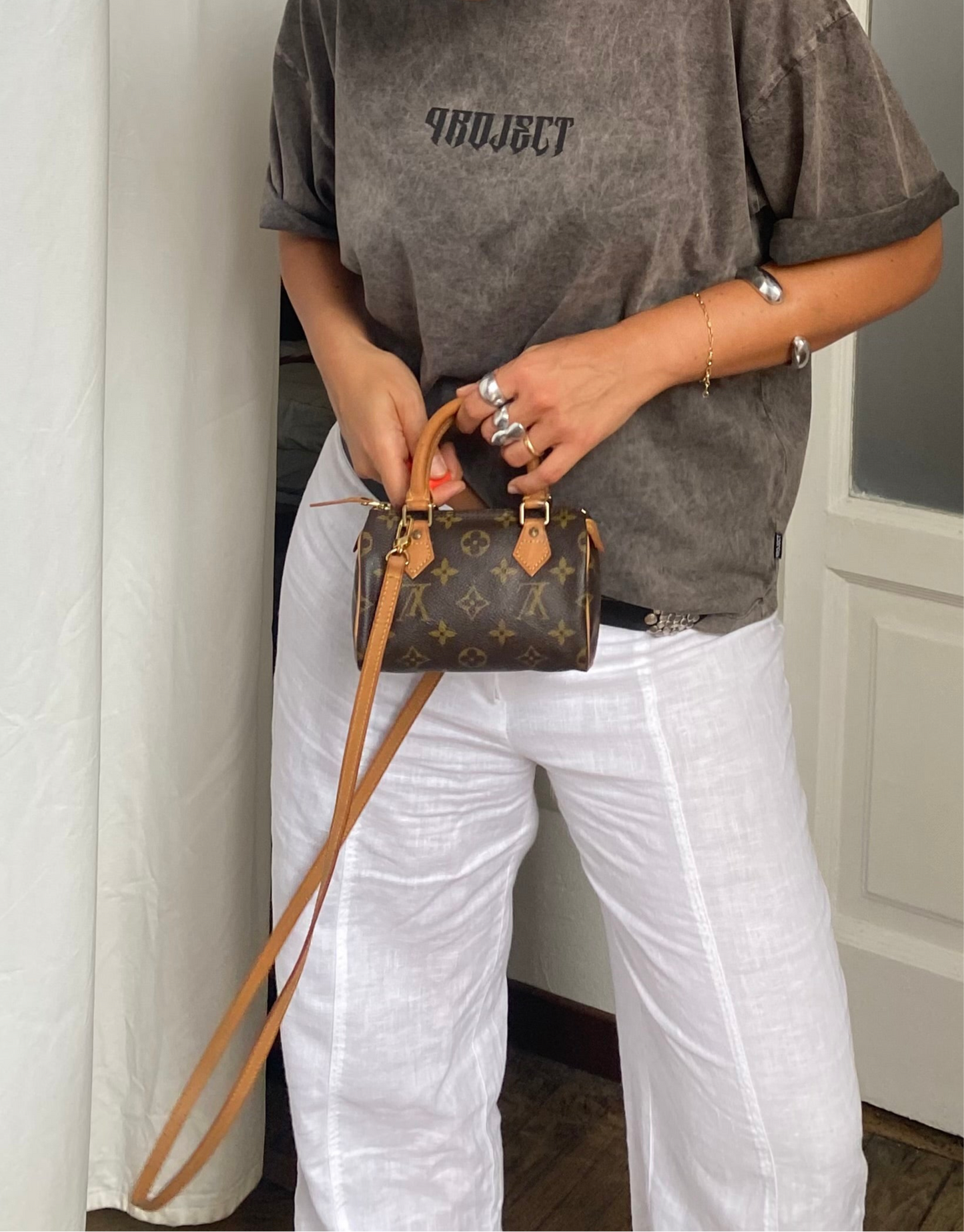 Louis Vuitton Nano Speedy monogram con tracolla