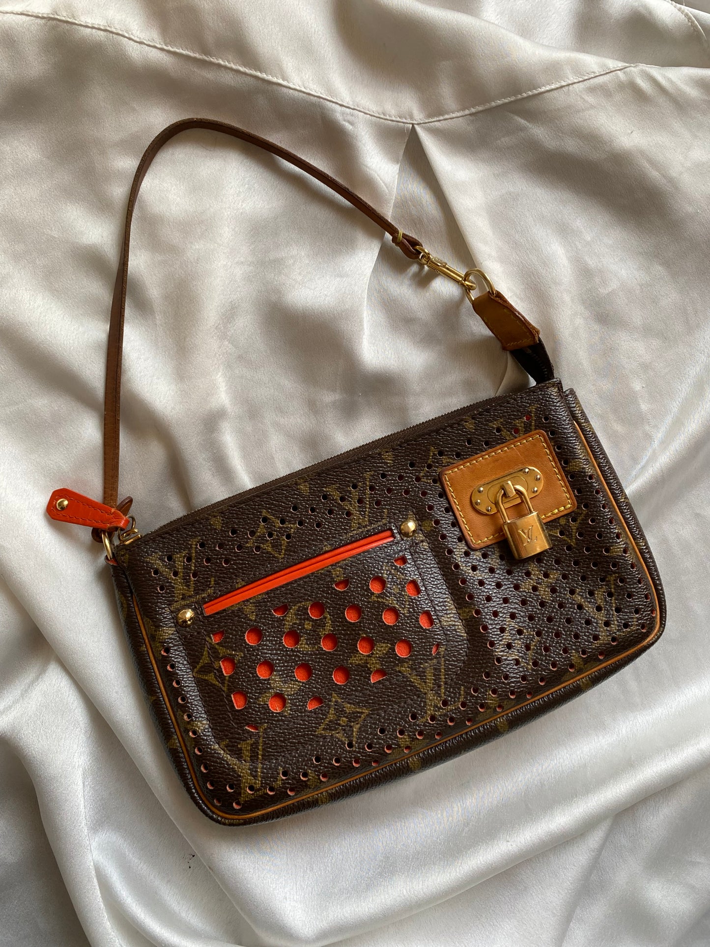Louis Vuitton pochette accessoire perforated orange