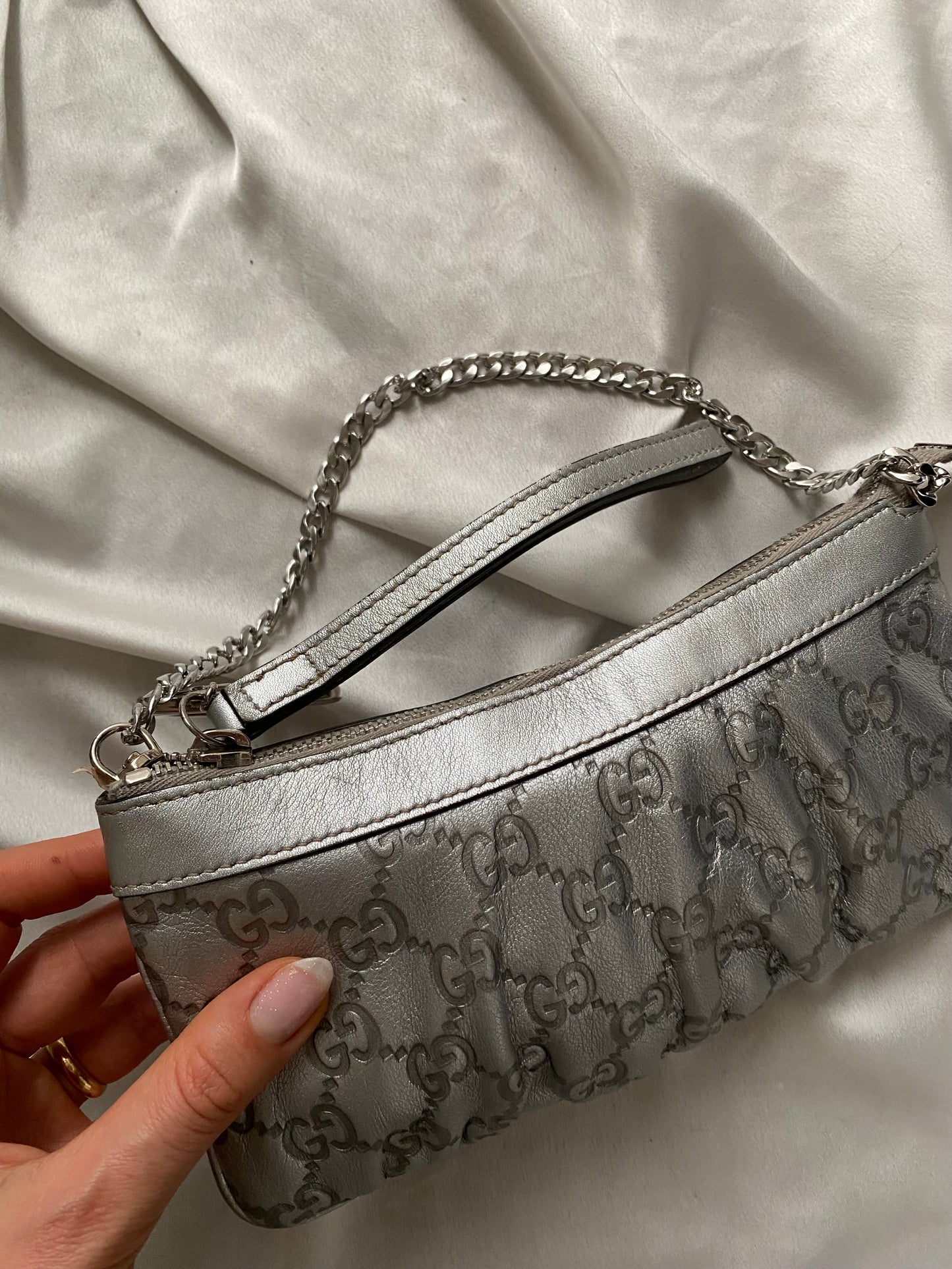 Gucci Pochette monogram pelle argento