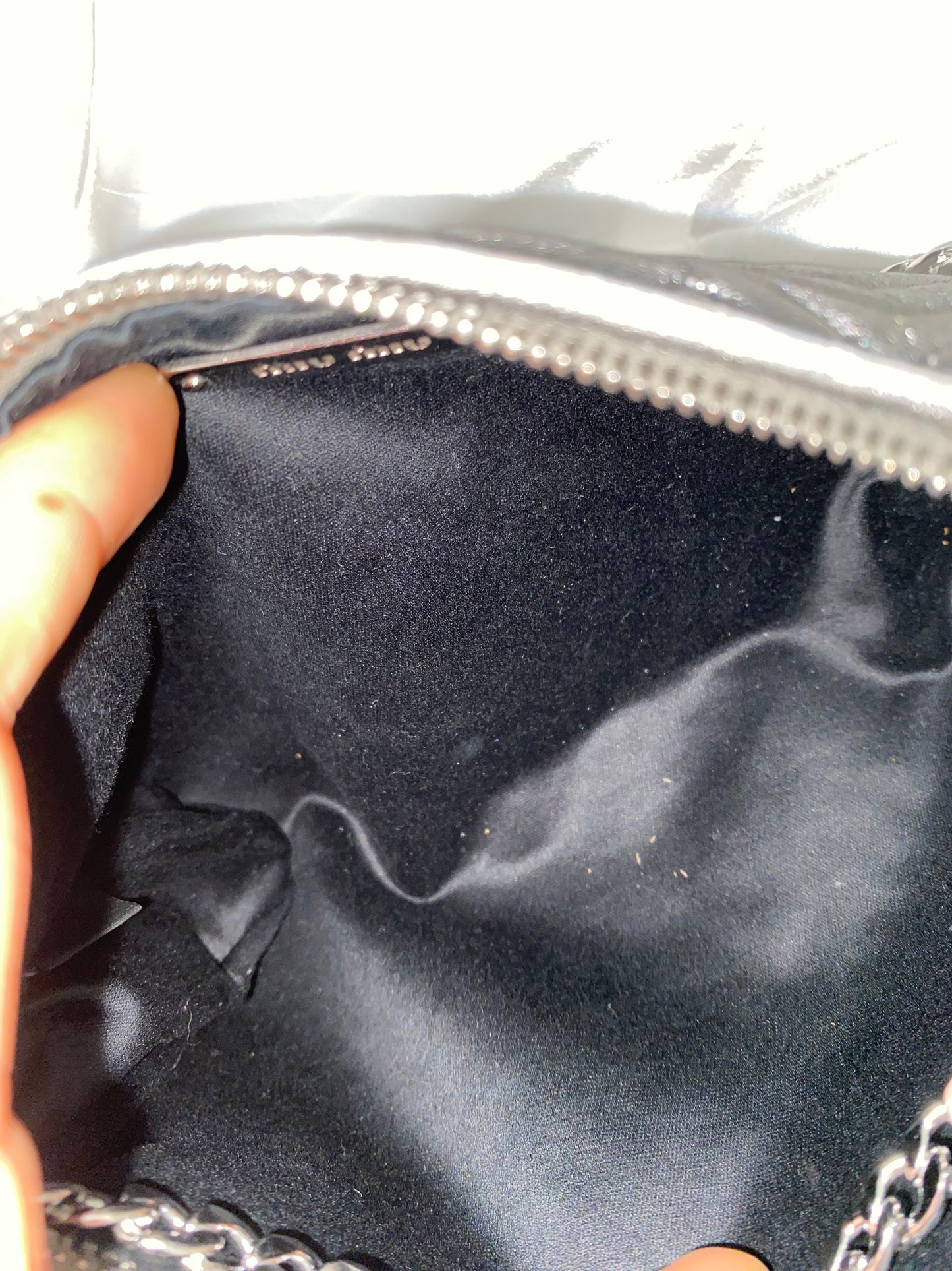 Miu Miu pochette argento metallizzato