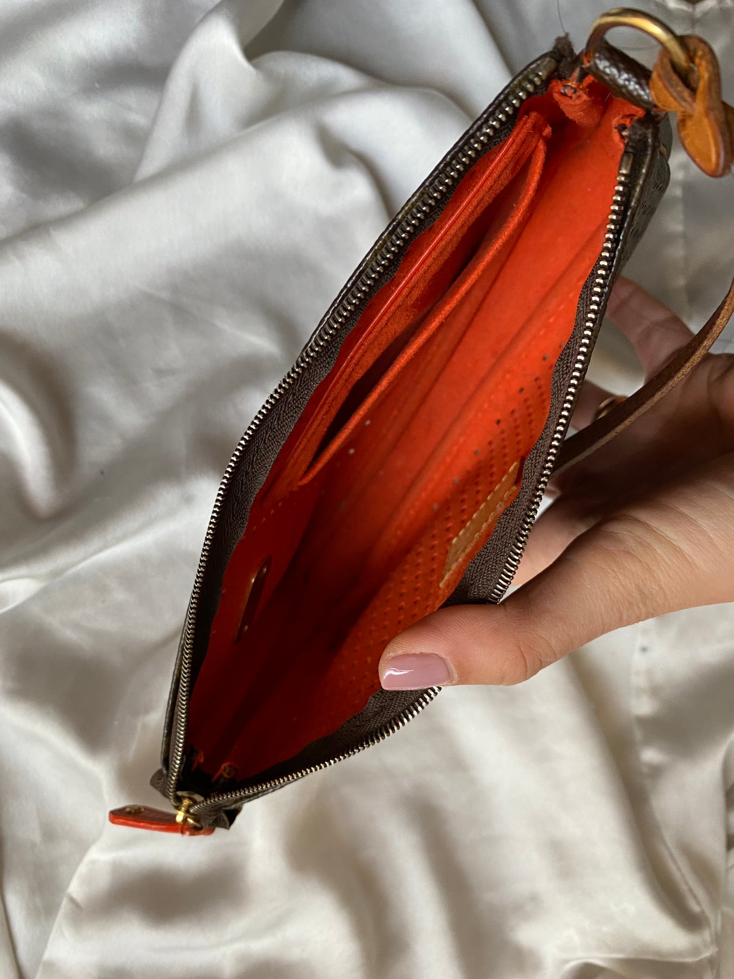 Louis Vuitton pochette accessoire perforated orange
