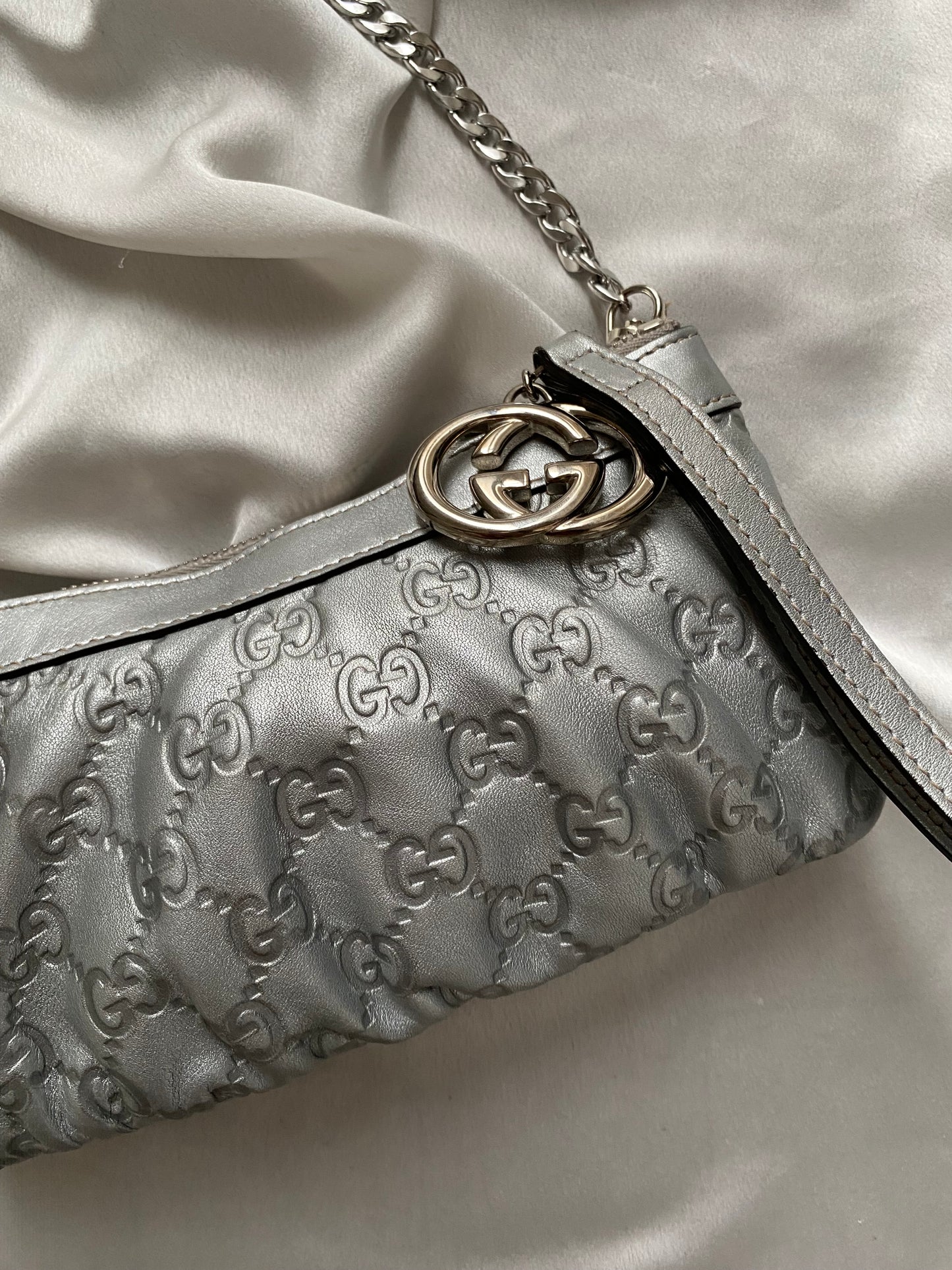 Gucci Pochette monogram pelle argento