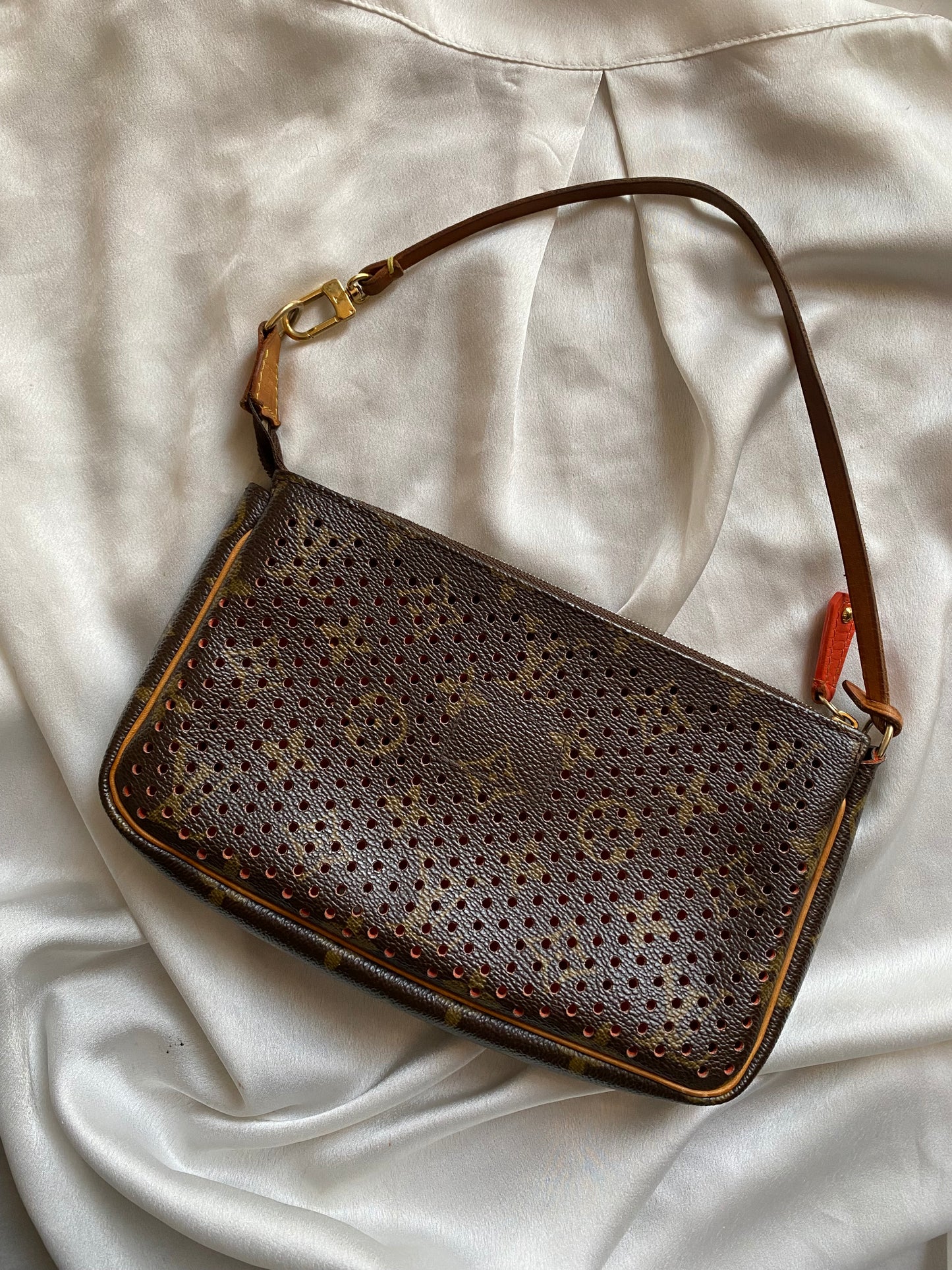 Louis Vuitton pochette accessoire perforated orange