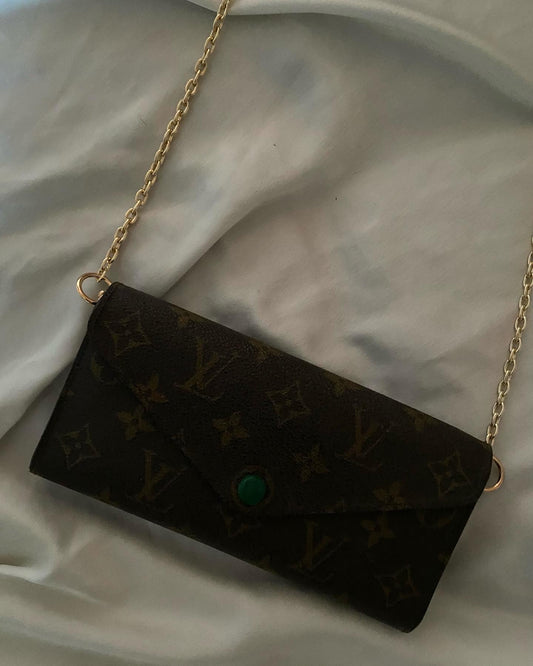 Louis Vuitton classic monogram clutch bag inside green