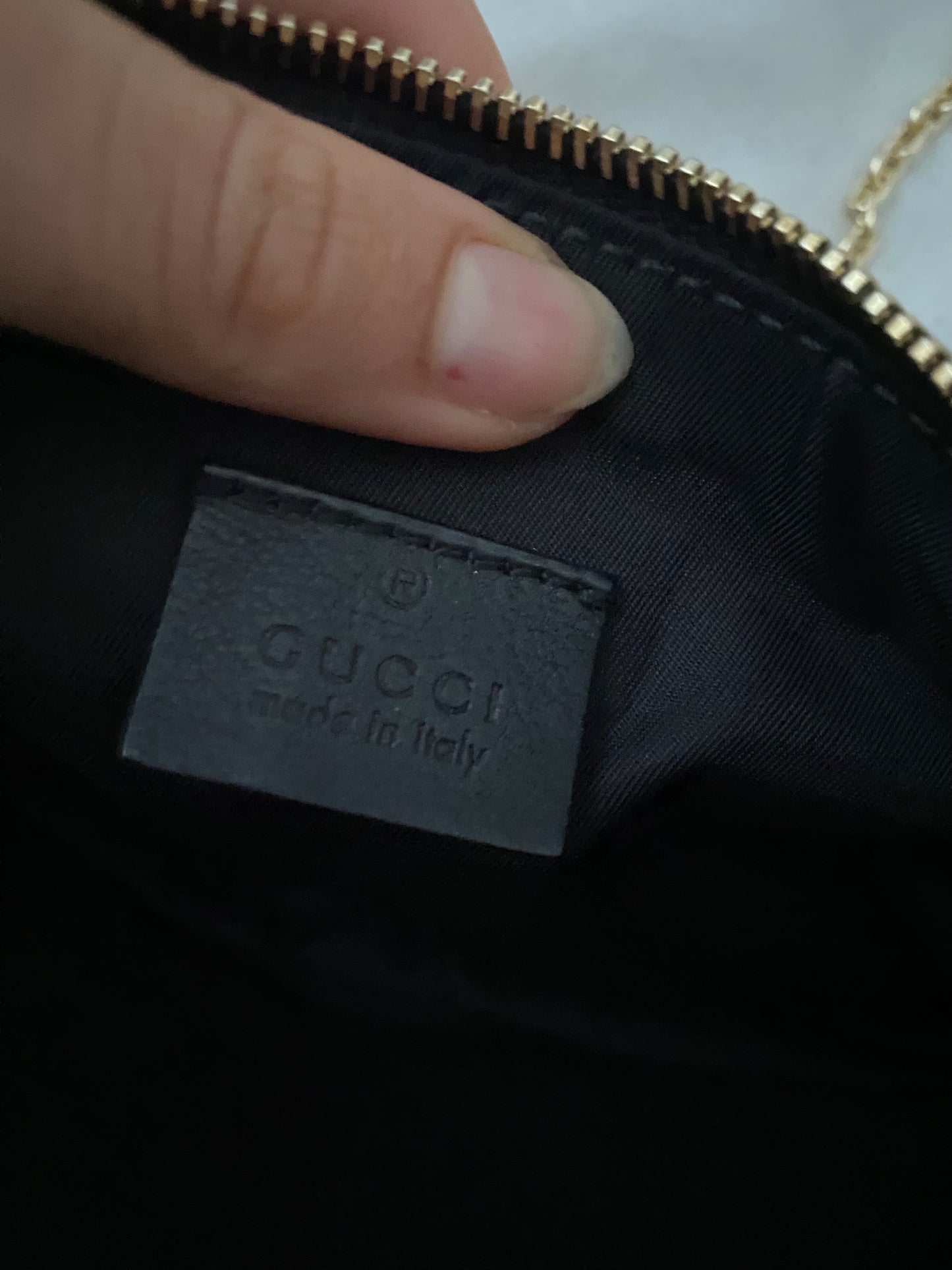 Gucci Pochette monogram nera logo