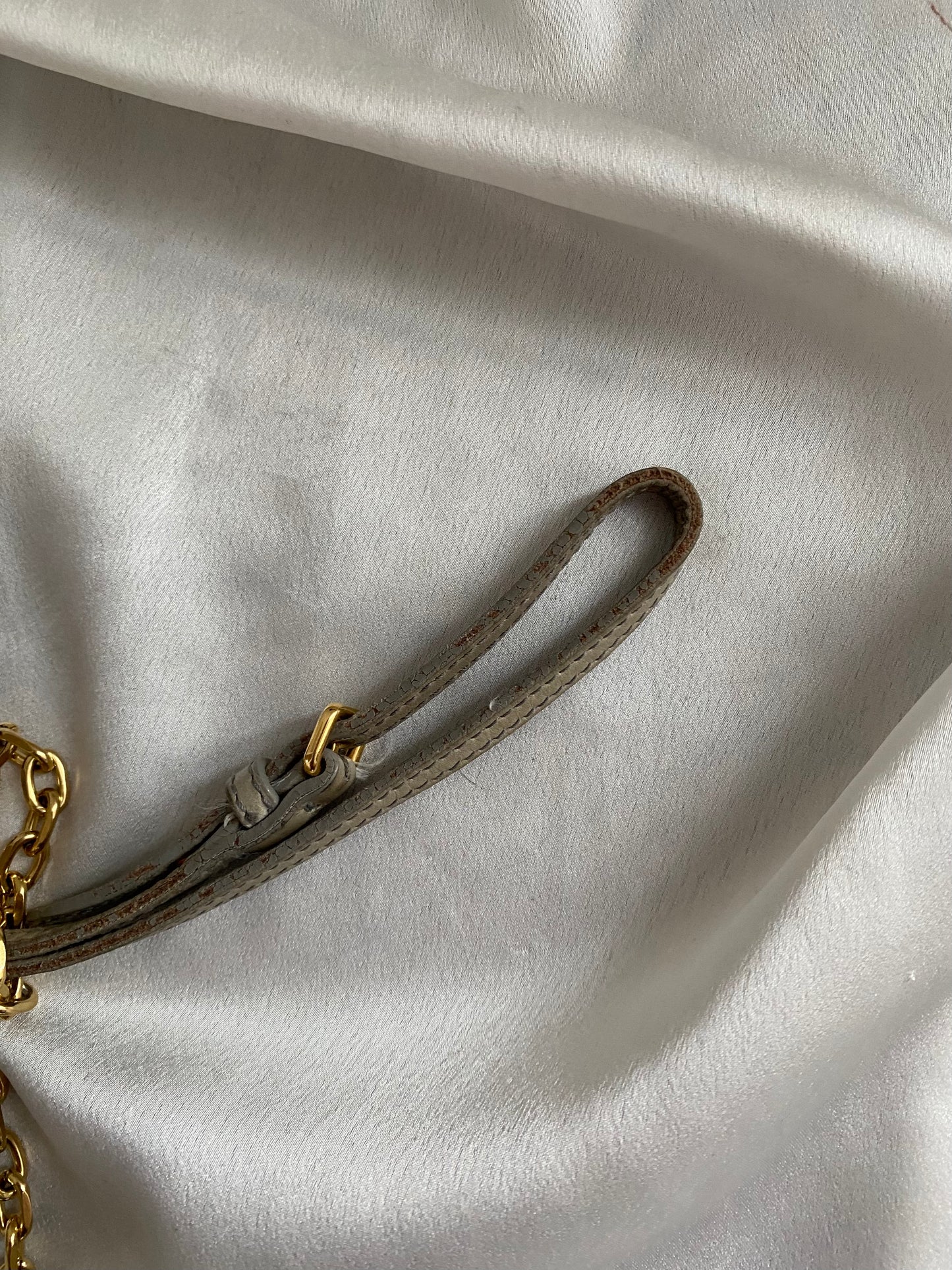 Miu Miu pochette grigia matelasse