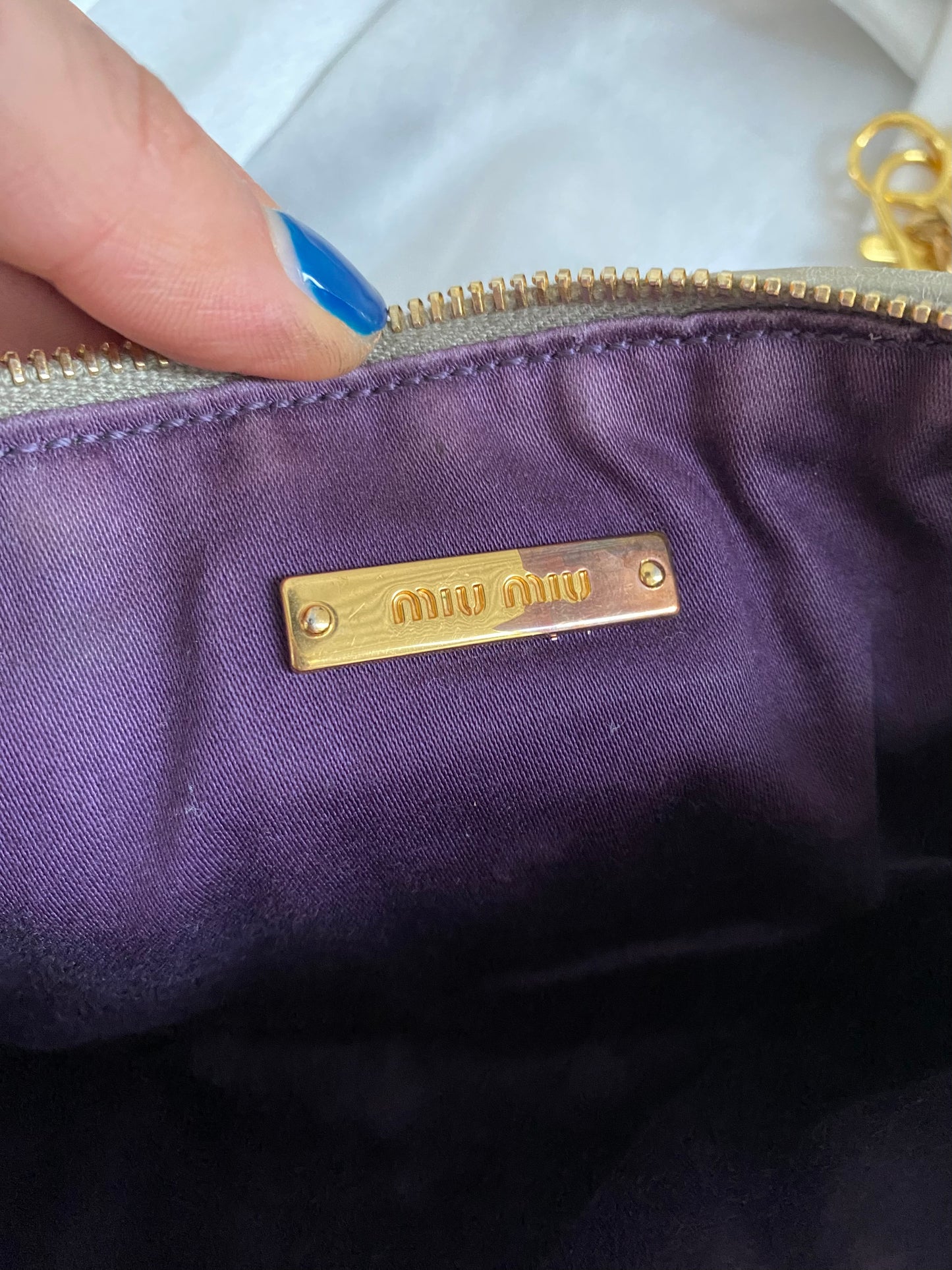 Miu Miu pochette grigia matelasse
