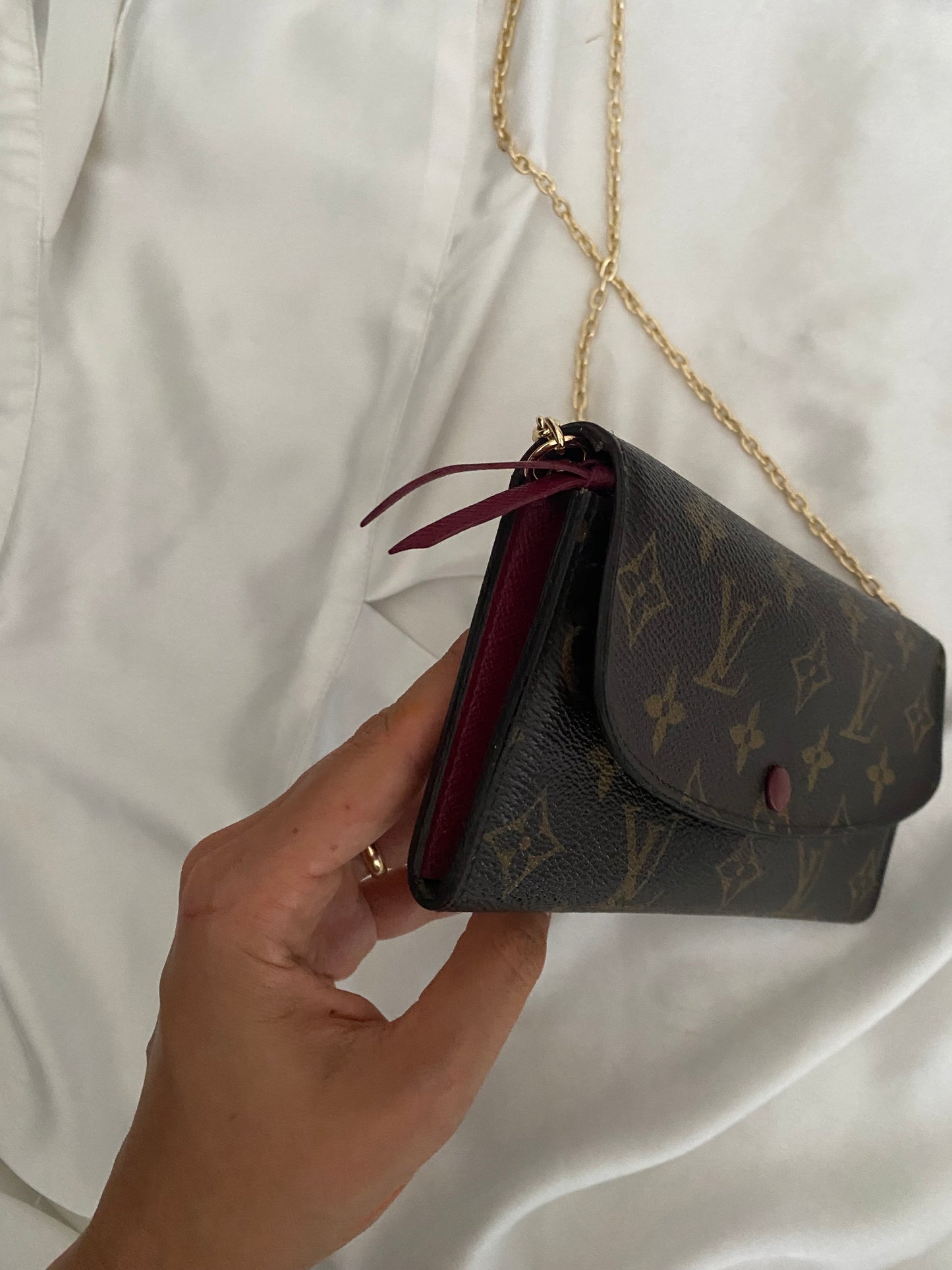 Louis Vuitton pochette Emilie interno fucsia