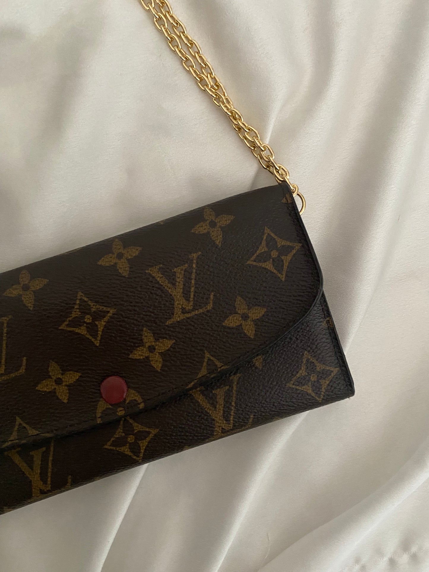 Louis Vuitton pochette Emilie interno fucsia