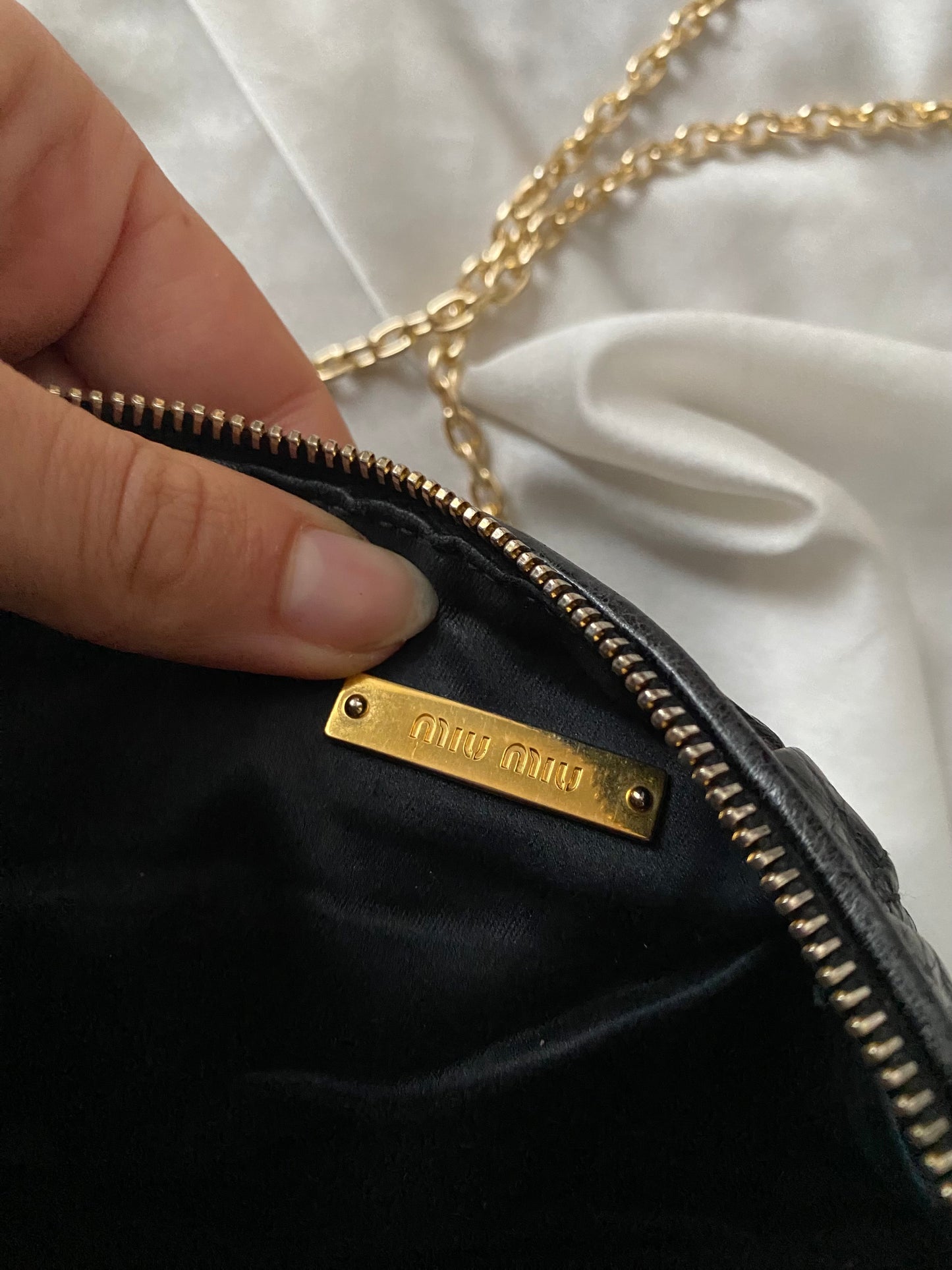 Miu miu pochette matelasse nera