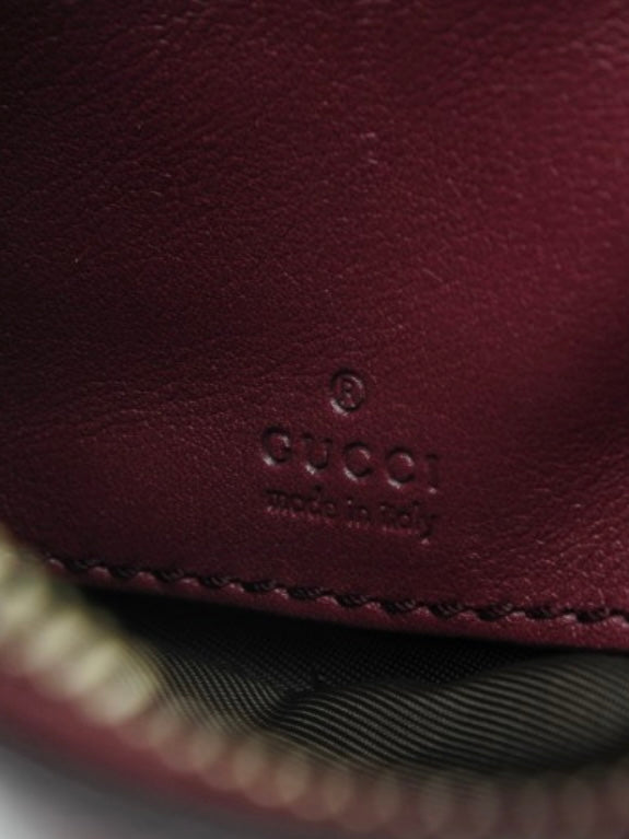 Gucci Pochette monogram bordeaux pelle