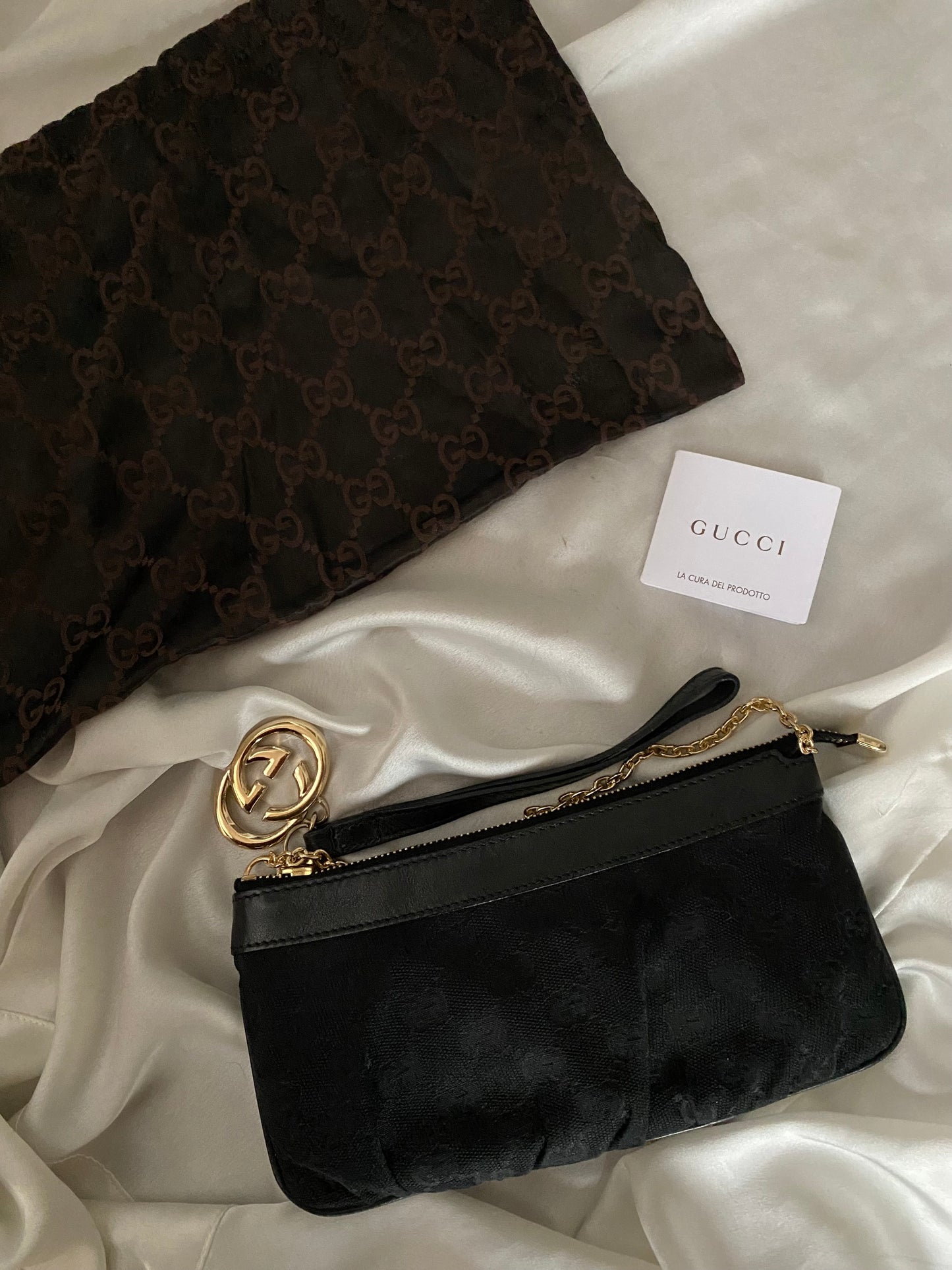 Gucci Pochette monogram nera logo