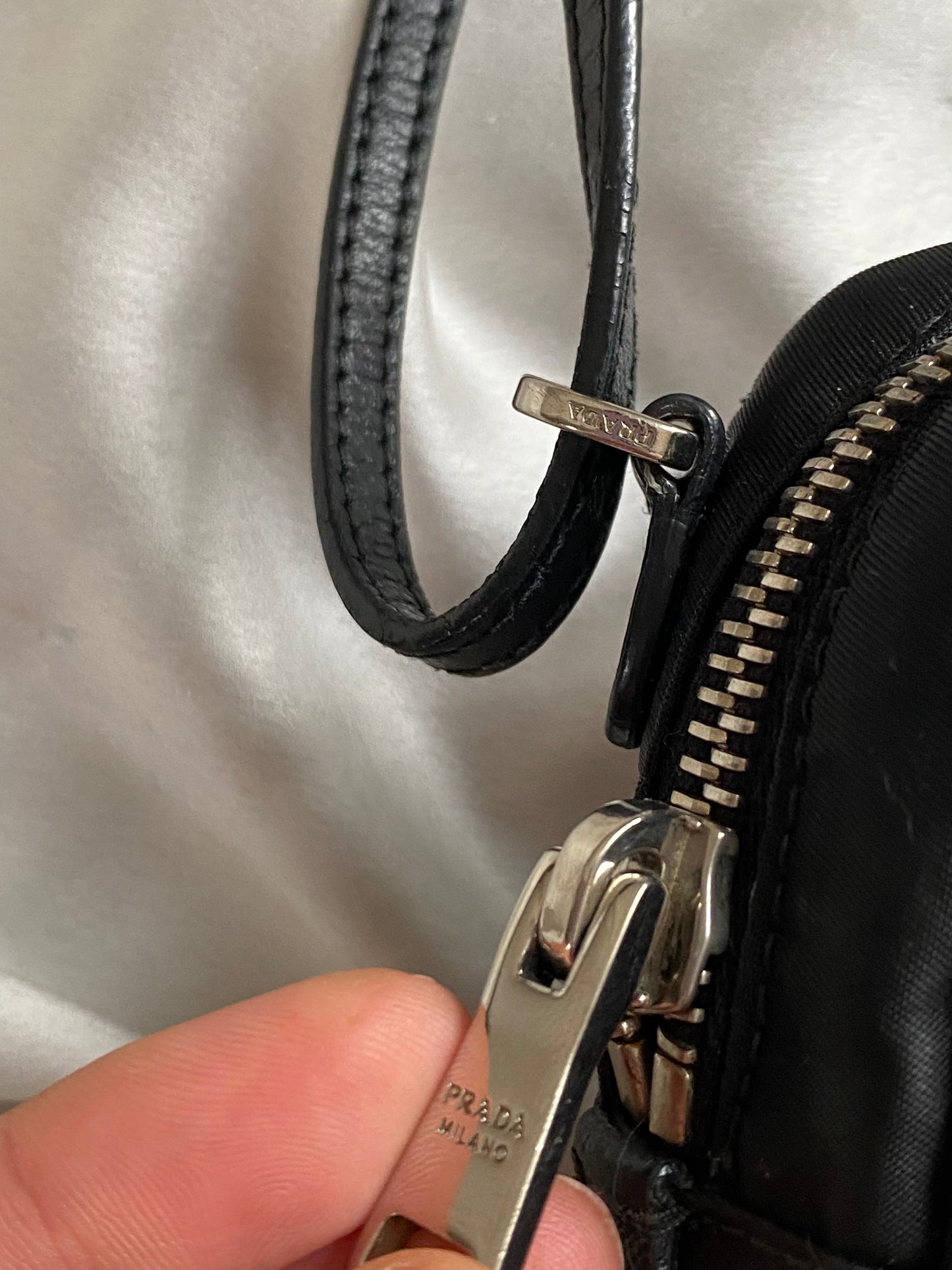Prada mini grommet