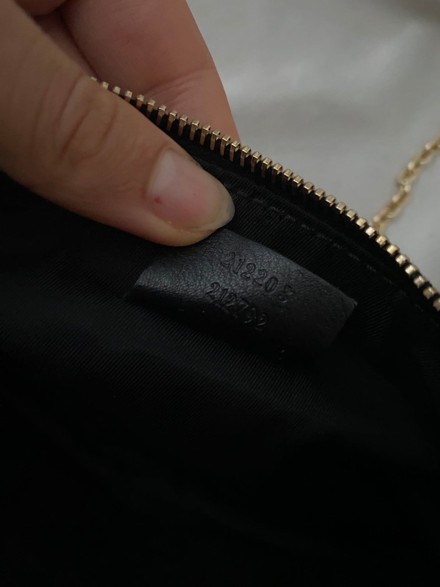 Gucci Pochette monogram nera logo