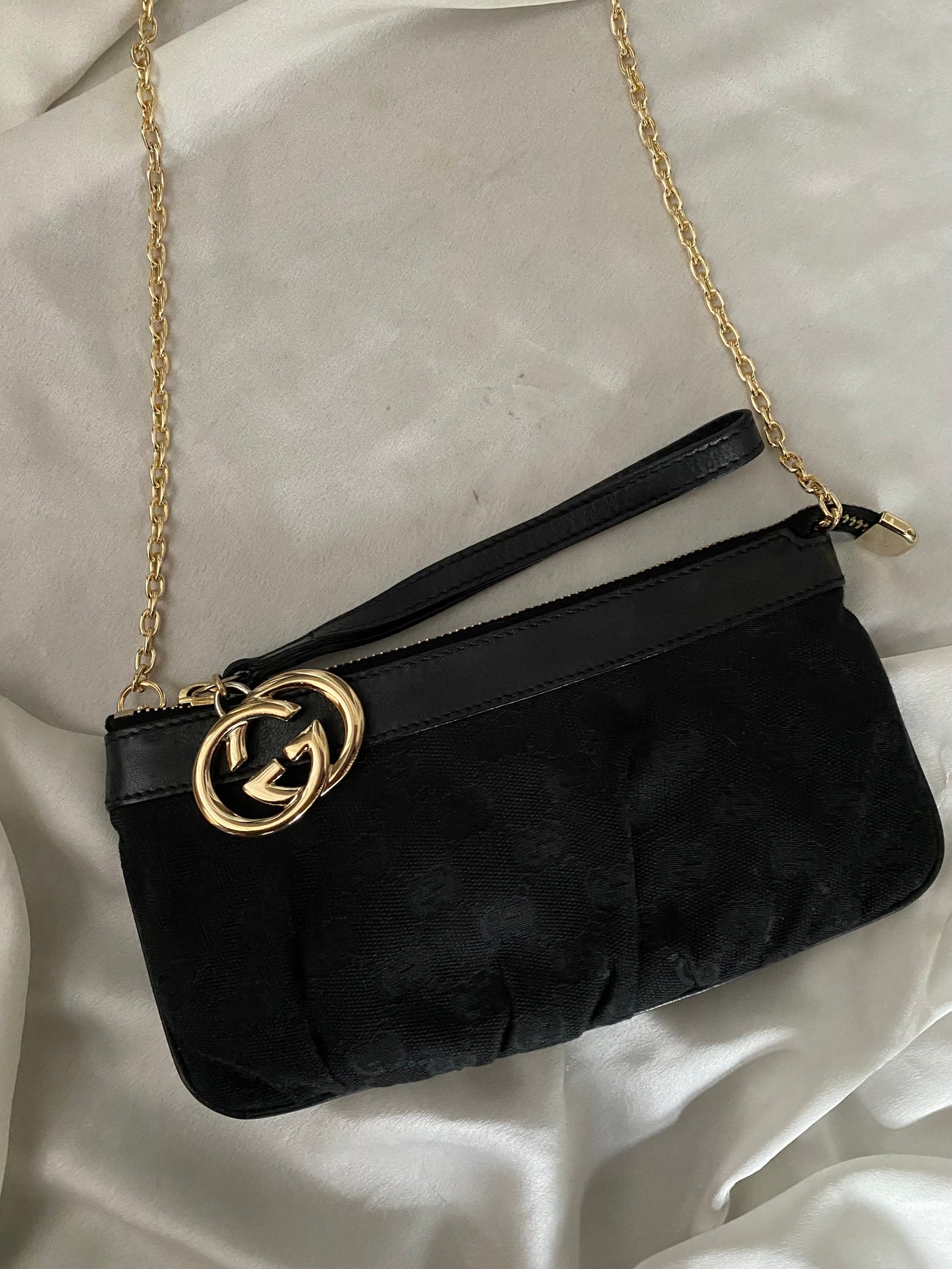 Gucci Pochette monogram nera logo