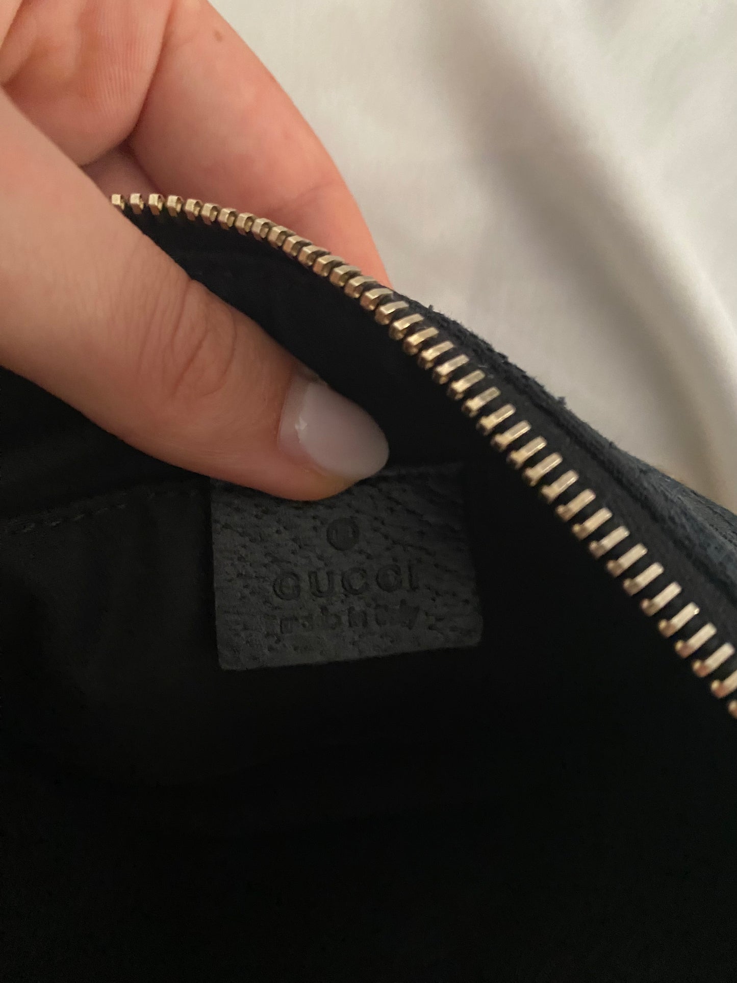 Gucci Pochette monogram  nera canvas con fiocco