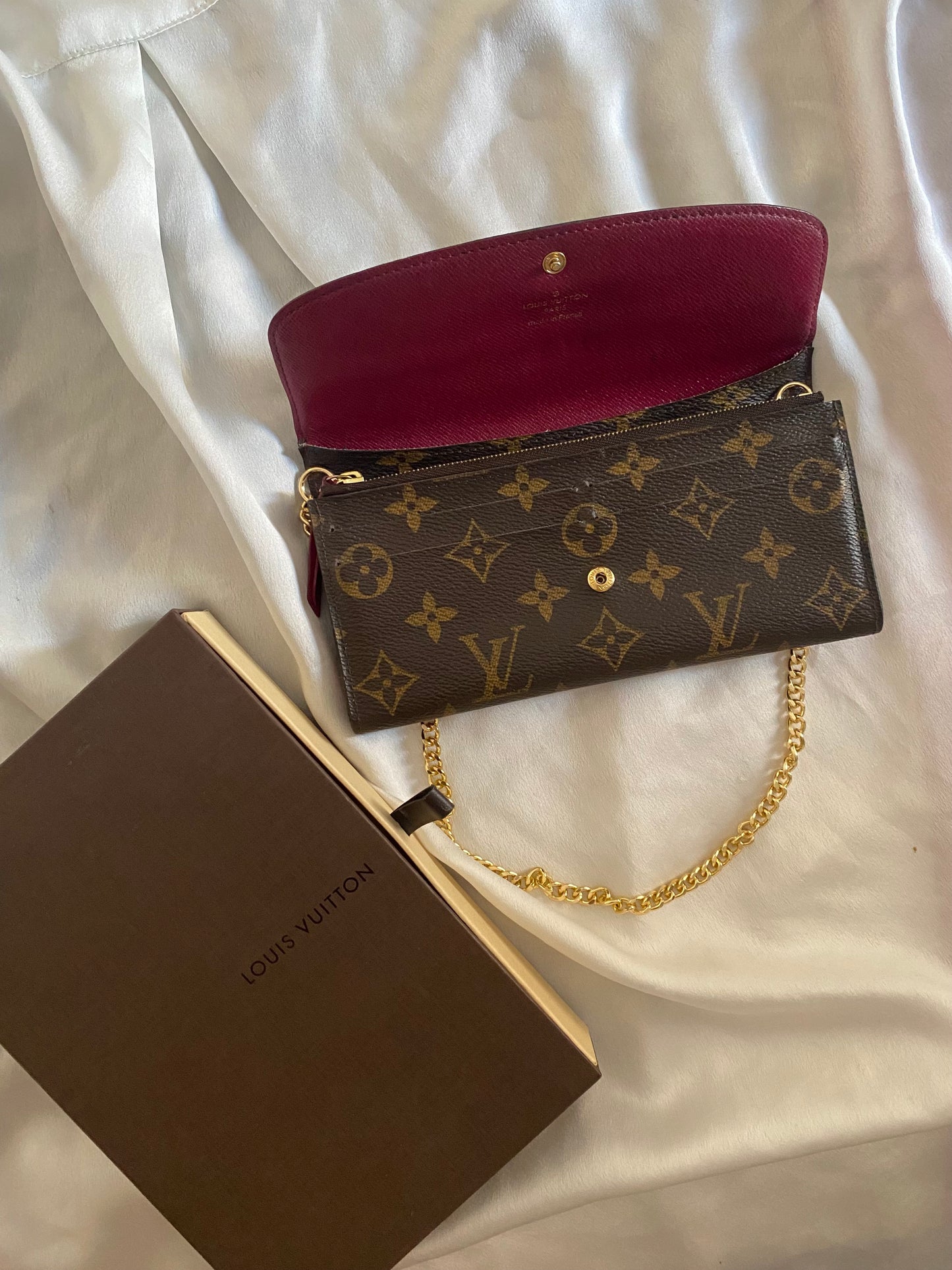 Louis Vuitton pochette Emilie interno fucsia