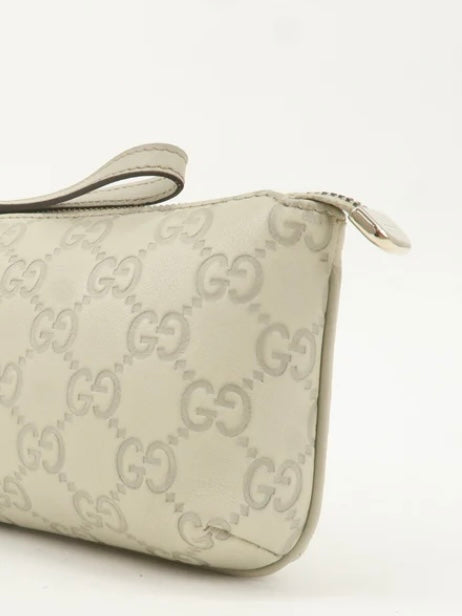 Gucci Ivory leather monogram clutch bag