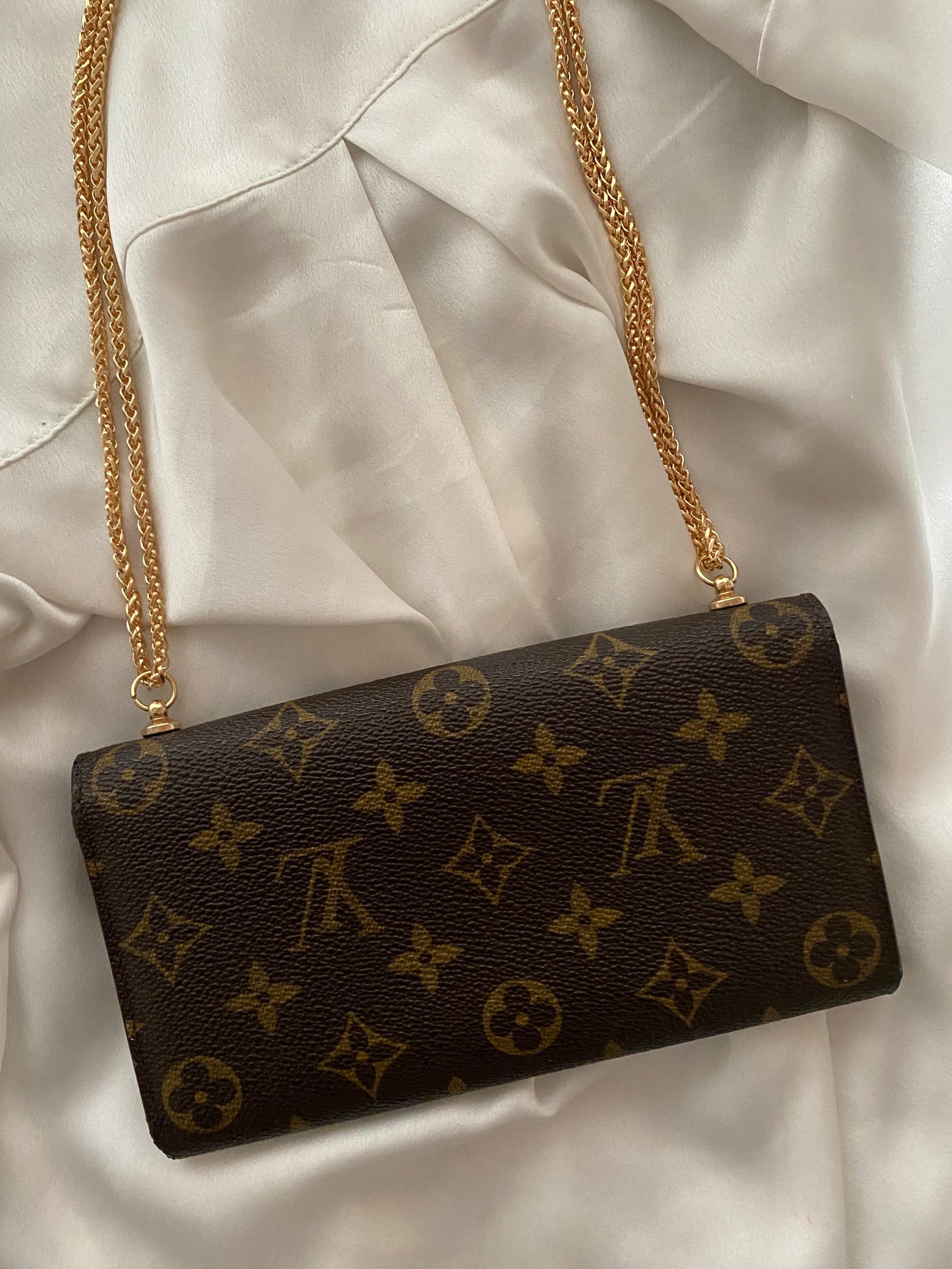 Louis Vuitton Monogram Pochette Reluxe