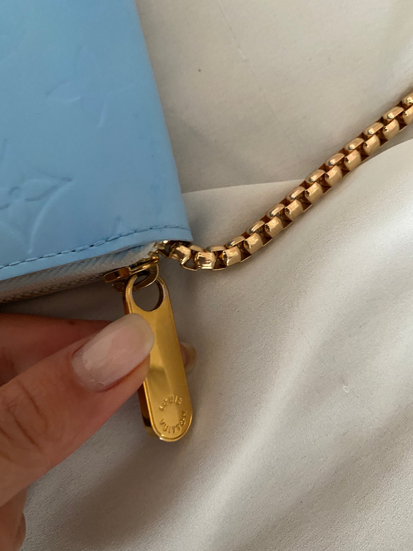 Louis Vuitton Pochette blu ghiacciaio